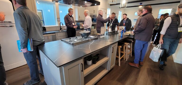 Evaluating modular home finishes and build quality inside a model home during KBIS
